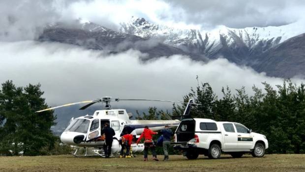 Helicopters on the ground in Wanaka waiting for the weather to clear.