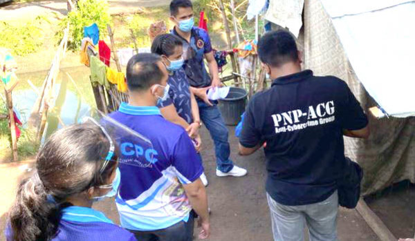 The Philippine National Police removes 14 children from harm in an earlier rescue operation based on Australian Federal Police information in 2021.