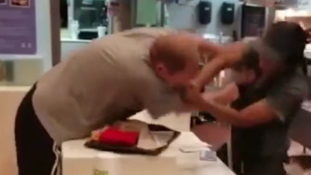 A McDonald's employee in Florida fought back against an angry customer after he grabbed her.