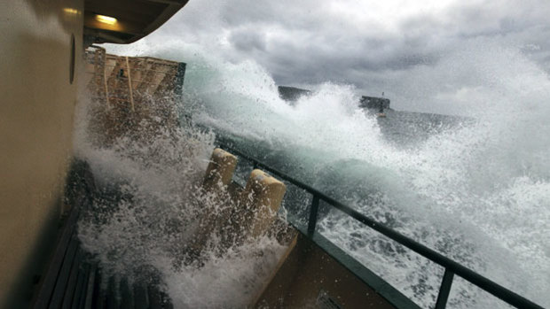 A Freshwater ferry endures large swells on the Manly route.
