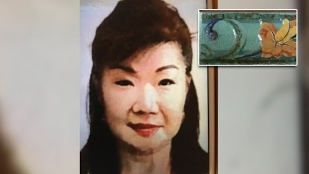 Annabelle Chen and one of the tiles found inside the suitcase dropped at the Fremantle Traffic Bridge.