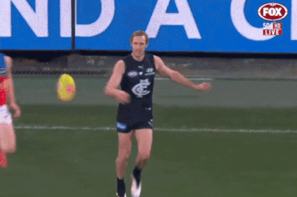 Ump clash: Carlton’s Lachlan Cowan collides with umpire Andrew Heffernan.