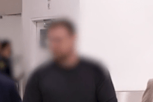 The suspect, 26-year-old Jan Kwazc, touched down at Sydney International Airport .