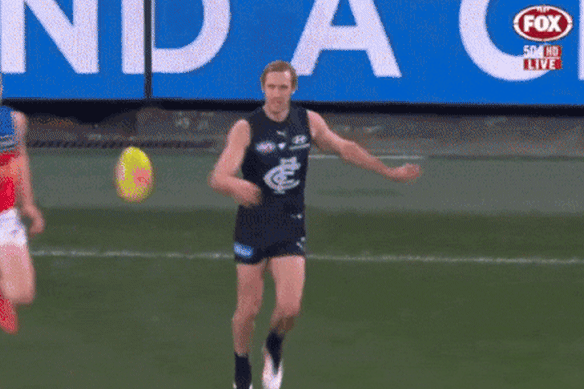 Ump clash: Carlton’s Lachlan Cowan collides with umpire Andrew Heffernan.