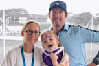 Brett Rankin with his wife and daughter.