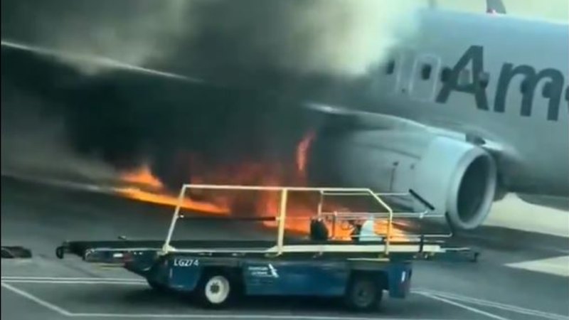American Airlines plane engine catches fire on the ground in Denver