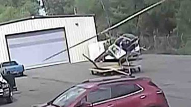 A police helicopter in Little Rock, Arkansas, loses control and crashes.