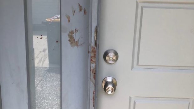 Blood was smeared on the door with hand prints after a teenage girl was stabbed multiple times in a Wynnum home.