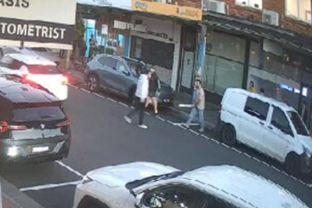 The confrontation spilled onto the street before the alleged attacker was restrained.
