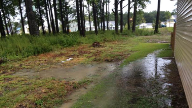  US Marine, 1st Sergeant Scott Johnson and wife Lindsey's flooded Lendlease-managed home in North Carolina. 