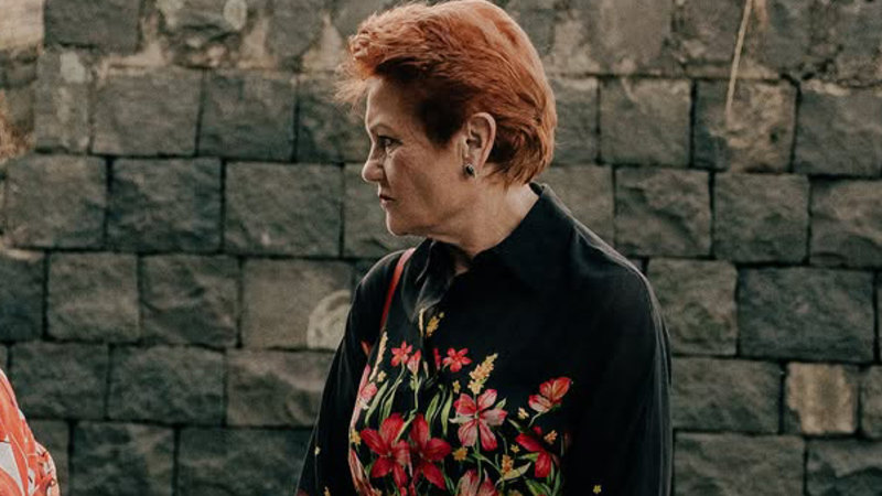 Hanson blasted for White Australia comments after attending lavish Italian fashion show