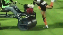 Andros Townsend sent to the ground and rolled over. 