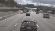 An SUV is sent flying into the air by another car on the Pacific Motorway at Eight Mile Plains.