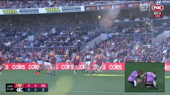 Patrick Cripps bumps Callum Ah Chee.