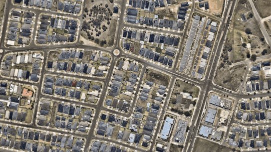 Gif of NearMap photos showing Edmondson Park from 2013 to 2023.