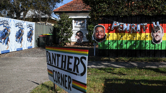 Vanessa Harris of the Penrith Early Learning Centre colours in Penrith Panthers players with ( From L to R ) Brody 4, Mila 3, Ashton 3, James 3, Alex 3 in Penrith yesterday. Photograph take September 29th 2023. Photograph by Dean Sewell.
 Scotty Evans of East Blaxland Butchery with his trademark Penrith Panthers coloured snags. Photographs taken Friday, 29th September 2023. Photographs by Dean Sewell.
A house along the Great Western Highway , Blaxland is adorned in Penrith Panthers paraphernalia ahead of Sundays NRL Grand final against the Brisbane Broncos. Photographs taken Friday 29th September 2023. Photographs by Dean Sewell.
Photograph shows Glenmore Park family out front of friend’s Pieta Rzepecki residence. Out front is Lottie Linderberg , 5 and Lacey Linderberg 8 with Dad Anthony Linderberg , Mum Erin ( red hair ) and Pieta Rzepecki in the background. Anthony later hammers in the Panthers letters. Photographs taken 29th September 2023. Photographs by Dean Sewell.
 - GIF