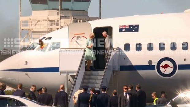 Prince Charles and his wife the Duchess of Cornwall boarding a flight from Wagga Wagga to Queensland ahead of the Commonwealth Games on Wednesday.
