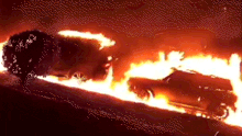 The cars quickly became engulfed in flames.