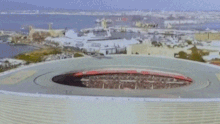 Planes fly over Cape Town Stadium.