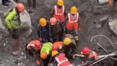 Two Australians found safe in Nepal as trapped workers rescued from tunnel