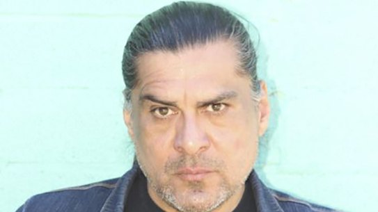 Jonathan Joss was shot dead as he checked his mail with his husband. 