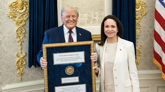 Donald Trump and Maria Machado with the Nobel Peace Prize at the White House on Thursday.