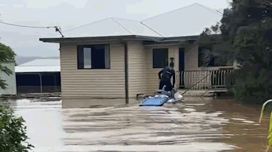 Guys near Coraki on there way to deliver supplies. Mick Fanning flood relief. Photo @Corner_Stores/Instagram (For Heath Gilmore)
Mick Fanning rescues local pharmacist Skye Swift on his jetski. Mick Fanning flood relief. Photo varela_swift_pharmacy/Instagram (For Heath Gilmore)
Checking out a house on jet ski at Tumbulgum. Mick Fanning flood relief. Photo Supplied (For Heath Gilmore)