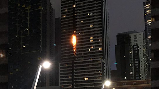 Flammable cladding on the Neo 200 apartment tower in Spencer Street burnt in February. The tower will now get public funding to remove any remaining flammable cladding.