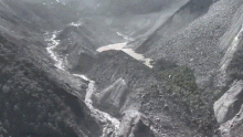 Aerial footage shows a “barrier lake” filling to overflow near the China-Nepal border.