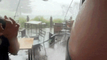 Footage shared on social media showed tables and chairs outside cafés in Ulladulla being swept down the street as winds reached gusts of 100km/h as a mini tornado hit.