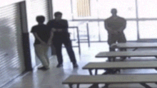 Two alleged people smugglers were arrested at a bakery in Weipa.
