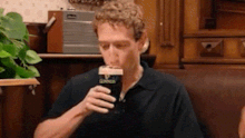 Mark Zuckerberg trying a Guinness for the first time.