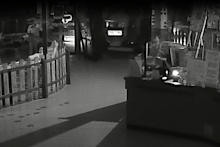 A stolen tractor crashes through the front doors of a cafe in Bundoora, Melbourne.