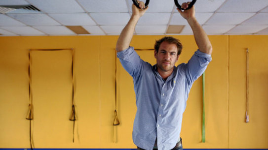 Leader of men ...   Rocky Elsom  relaxes before hitting the gym at Brookvale this wee and, inset, rallying his troops during the dispiriting loss to the All Blacks at Wellington last year.