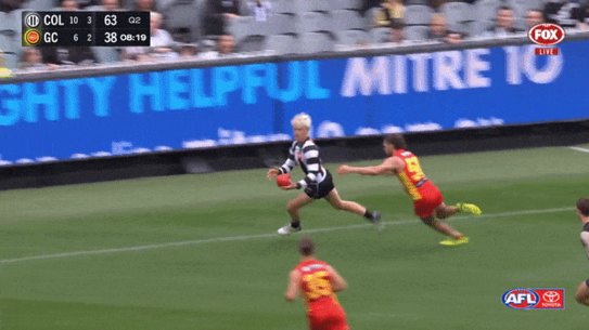 Jack Ginnivan kicks a goal of the year contender.