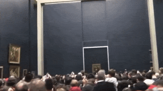 Crowds gather at the Mona Lisa.