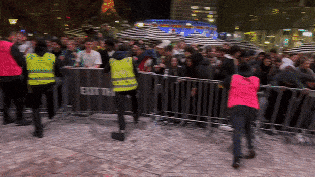 ‘No excuse’: Search for flare-throwers after rowdy fans storm Fed Square