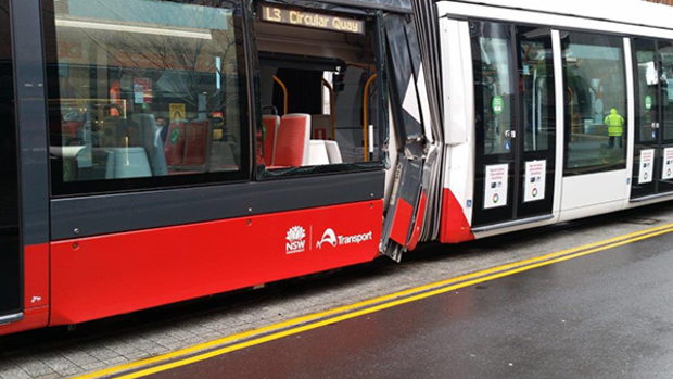 Tram badly damaged after collision with truck in George Street