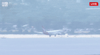 Qantas flight QF144 lands in Sydney.