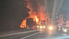A witness photo of the fiery crash that killed a truck driver at the Victoria-South Australia border early on Thursday morning.