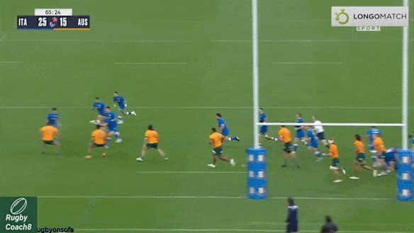Italy fullback Ange Capuozzo scores against Australia in Florence.