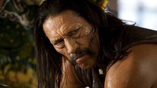 Danny Trejo plays ex-cop Machete.