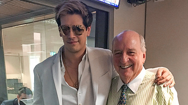 Controversial political commentator Milo Yiannopoulos (L) poses for a photo with radio broadcaster Alan Jones. 