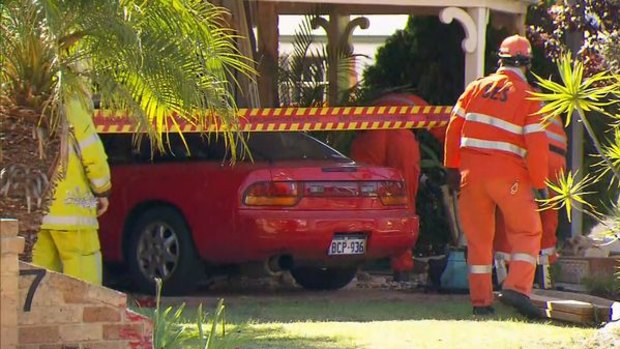 A Perth woman who was dozing on a lounge in her home's front room was woken to the terrifying sound of a car smashing into the house. 
