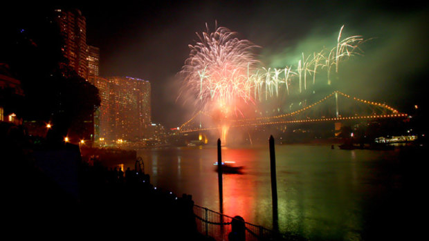 Brisbane city lights up under the spectacular fireworks display of Riverfire.