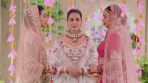 A lesbian wedding on mainstream Indian TV? Practically unheard of. Lisa Ray, right, plays the girlfriend of Umang (Bani J, left, with Kulhari, centre).