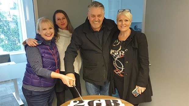 Ray Hadley cutting his celebration cake without Alan Jones.