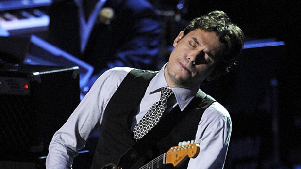 John Mayer only has eyes for his guitar.