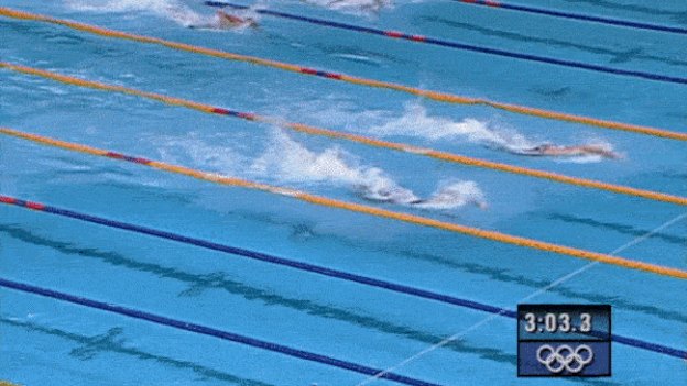 Ian Thorpe comes to the wall ahead of Gary Hall jnr in the 4x100m freestyle relay.