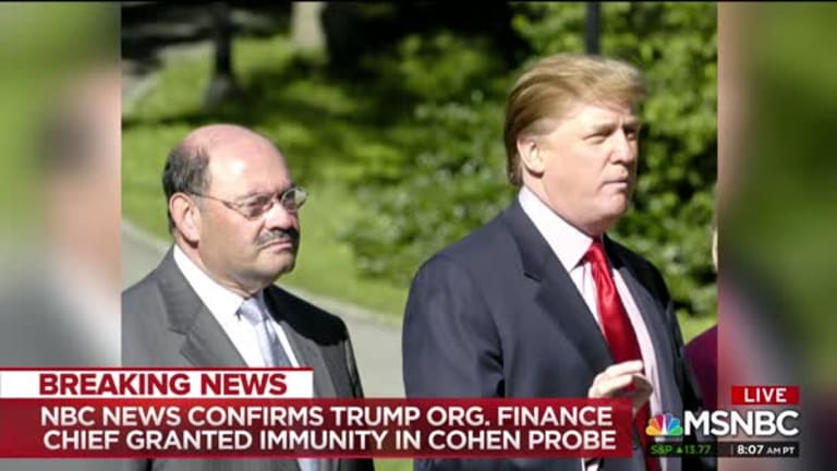 Donald Trump pictured with Trump Organisation chief financial officer Allan Weisselberg.